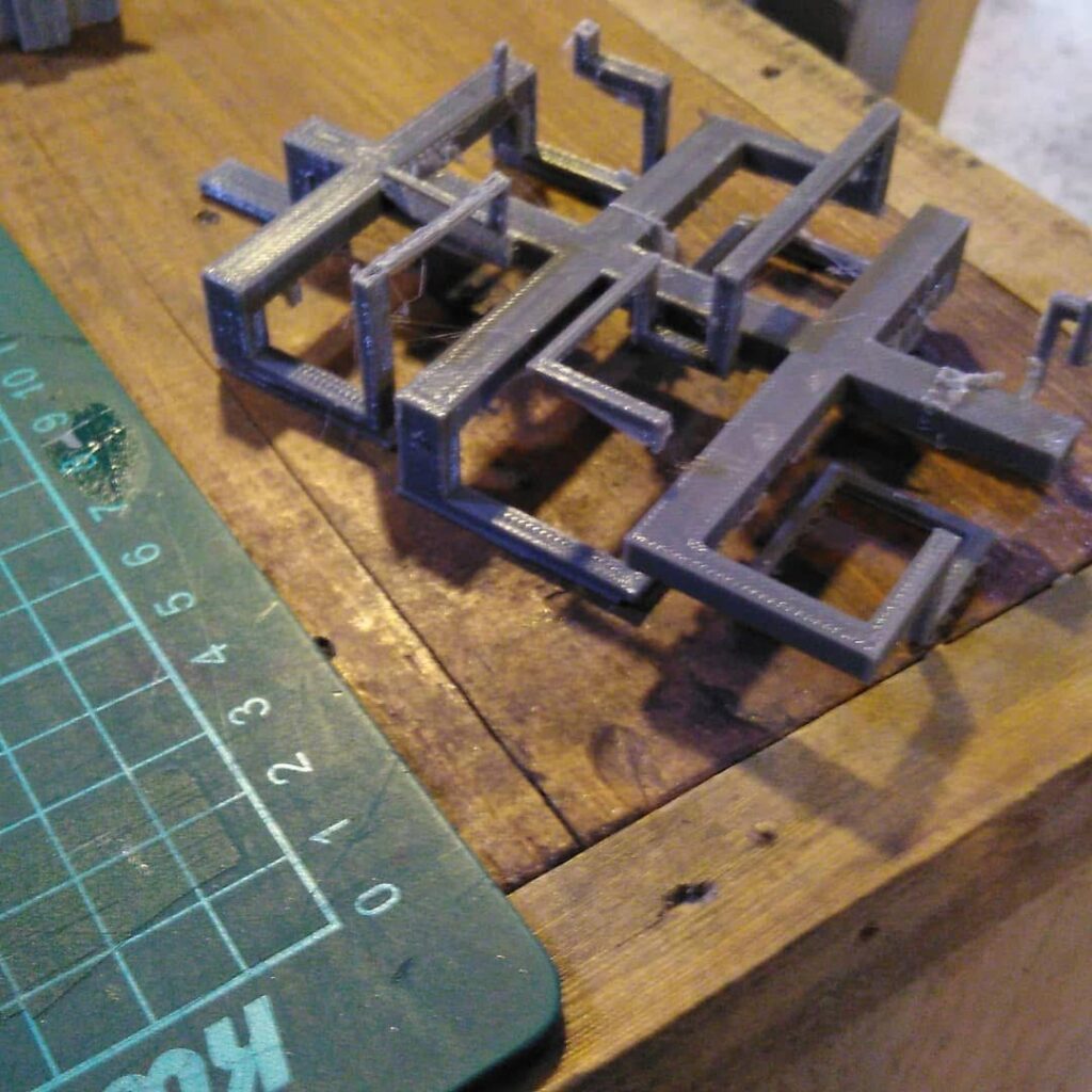 Gray 3D-printed structural prototype produced by SHARK for a student project.