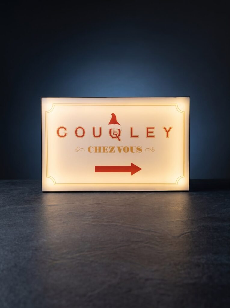Illuminated hospitality directional sign for guest wayfinding