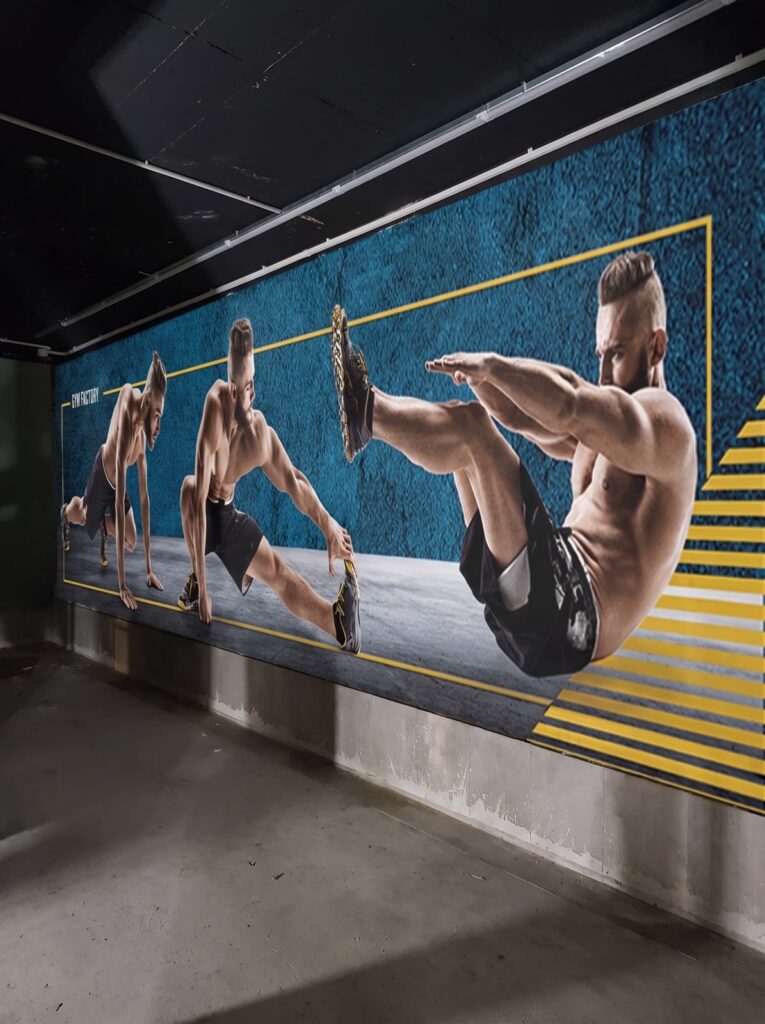 Large wall banner produced for Gym Factory in Tripoli by SHARK.