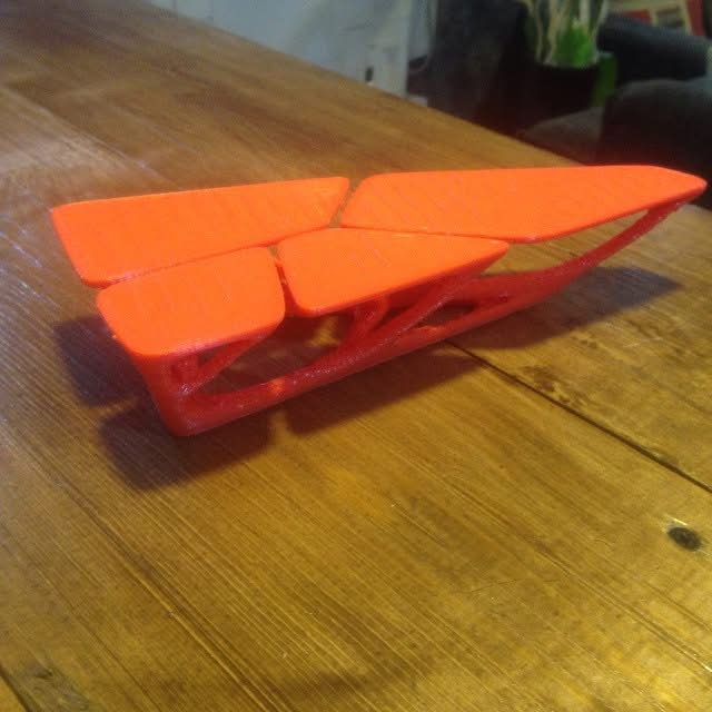 Orange 3D-printed furniture prototype produced by SHARK for a student project.