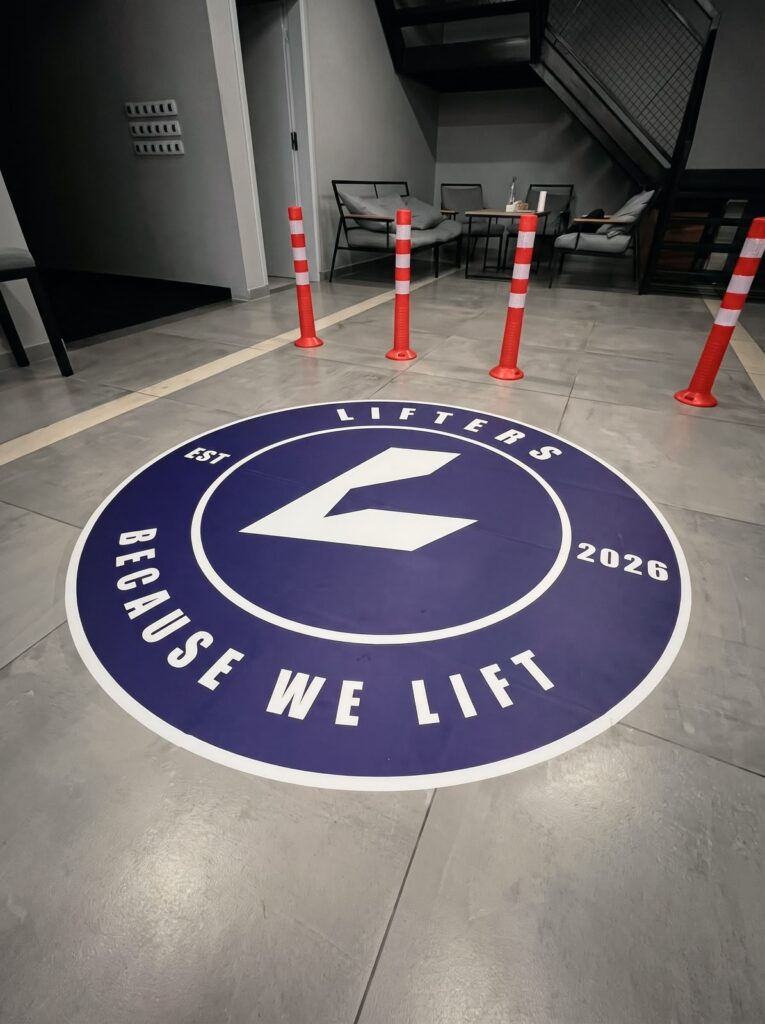 Custom gym floor decal graphics produced and installed by SHARK.
