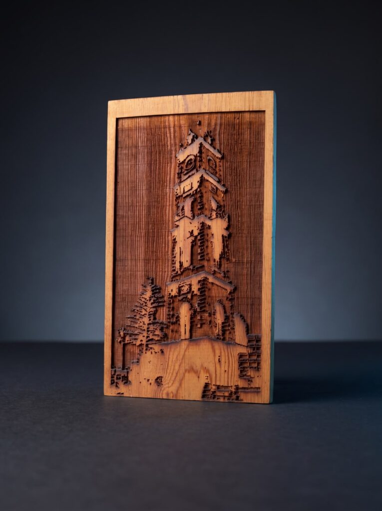 Laser-engraved wooden Tripoli Clock Tower artwork by SHARK