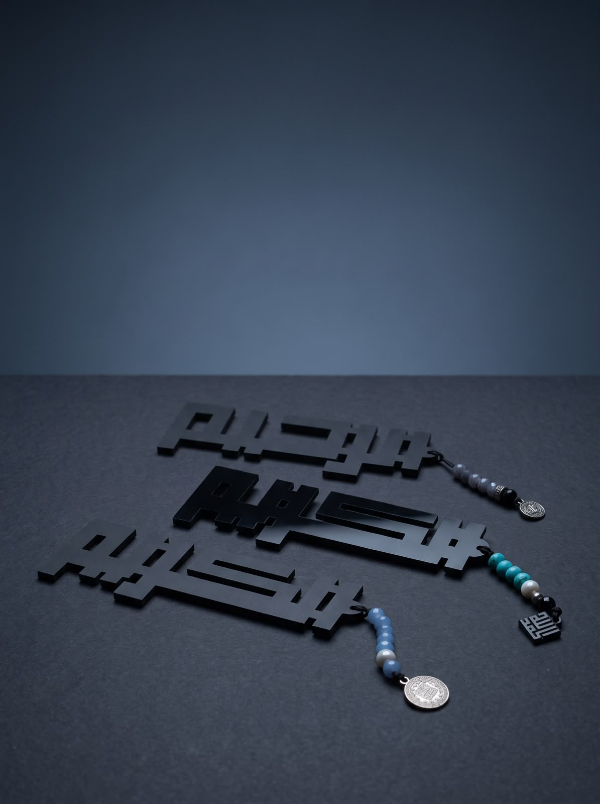 Laser-cut Arabic acrylic keychains produced by SHARK